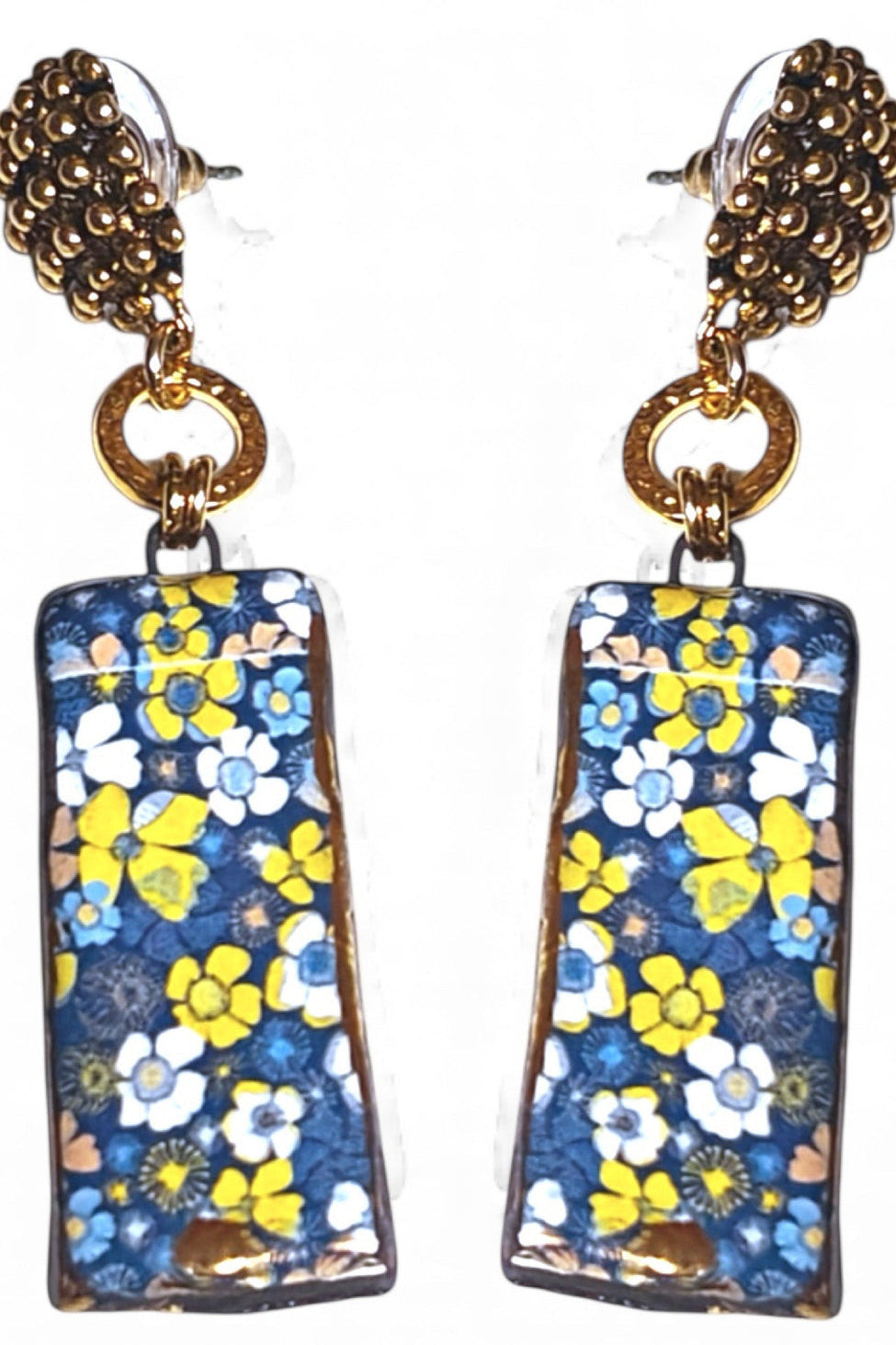 Floral patterned earrings with gold accents on a white background
