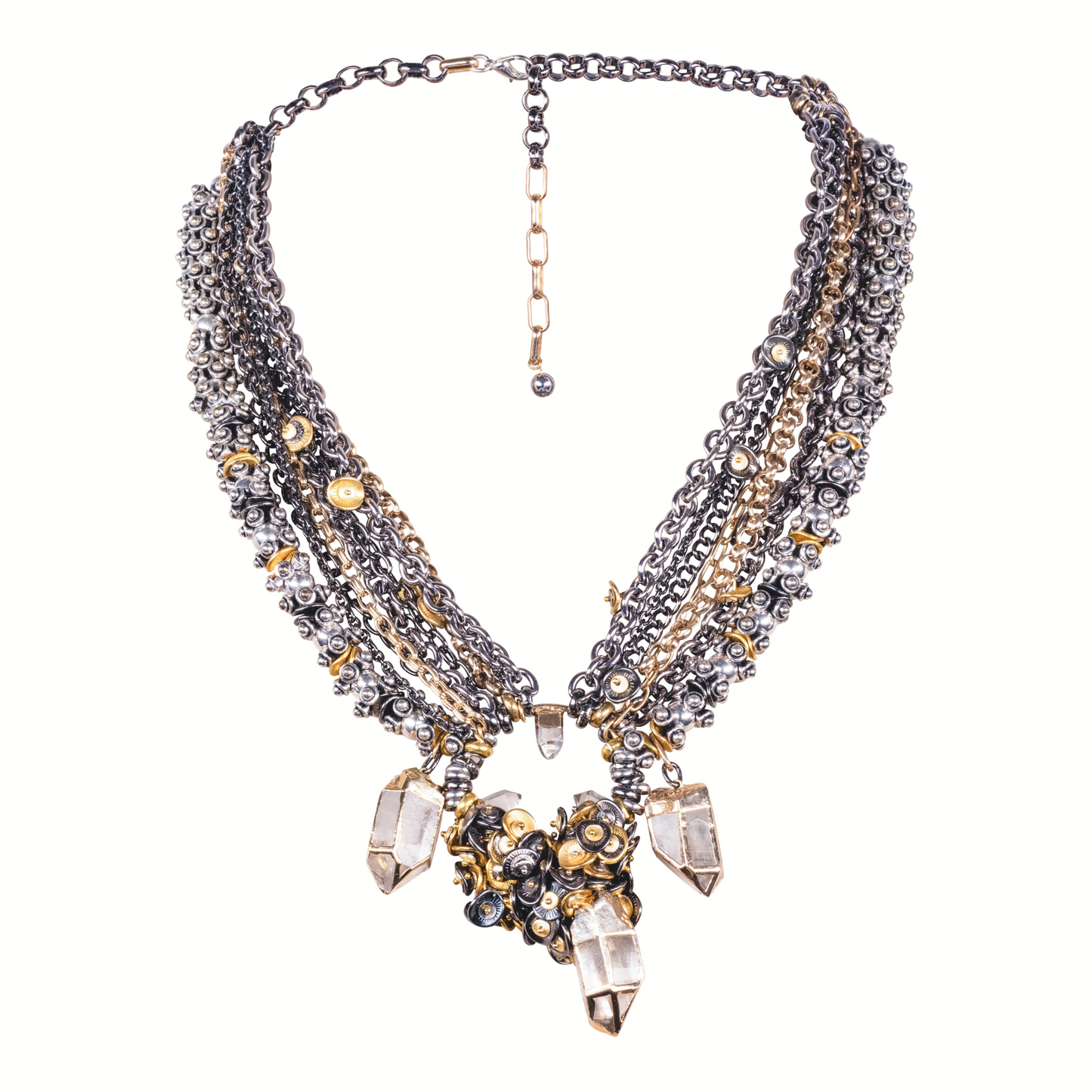 Multistrand necklace with crystals and gold accents on a white background