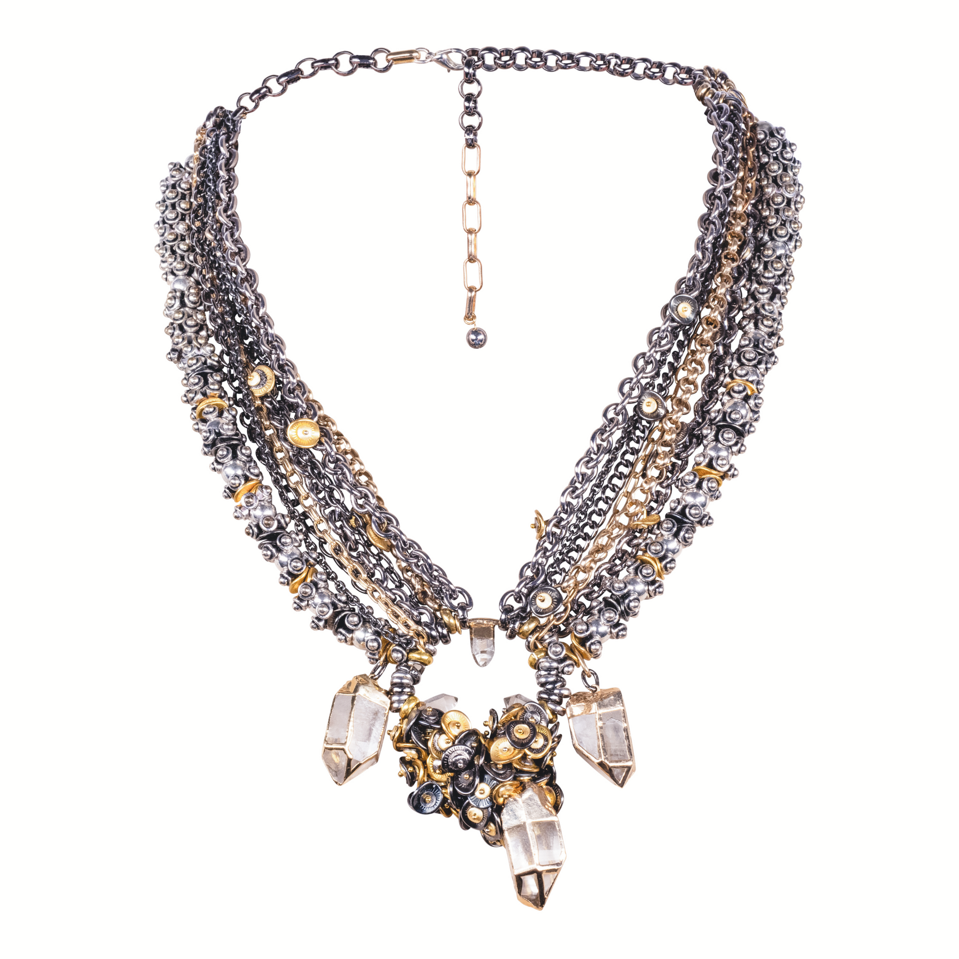 Multistrand necklace with crystals and gold accents on a white background