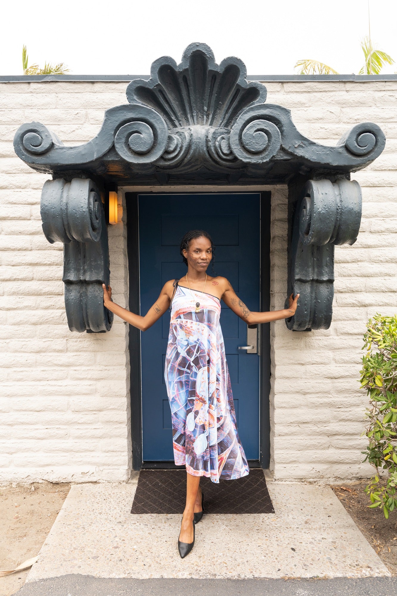 Woman wearing Ayphyx The Ethereal Halter Dress
