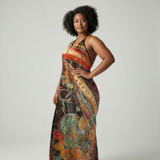 Woman wearing Orire Afrofuturism Halter Dress on white background